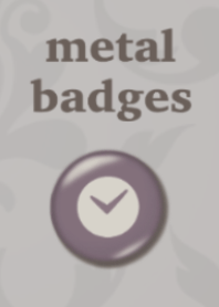 Pink metal badge