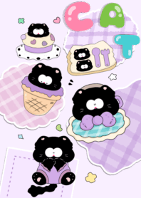Black cat with light colored pastries