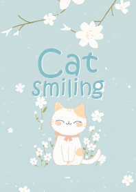 lucky cat in blooming blue flower