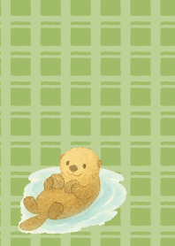 Cute sea otter on moss green