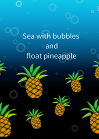 Sea with bubbles and float pineapple