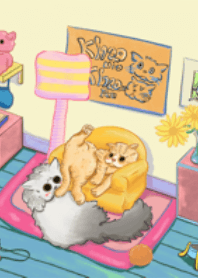 The two cats is on the sofa in the room.