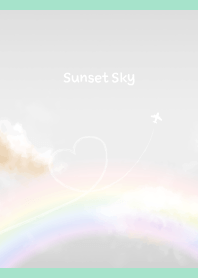 癒しの空と飛行機雲 青緑