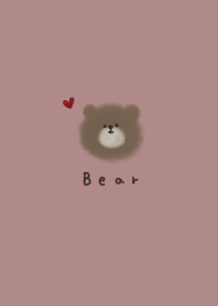 Dull pink and fluffy bear.