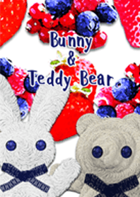 Bunny and teddy bear with berries