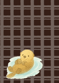 Cute sea otter on brown