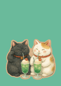 W & B Beckoning Cats on bluegreen