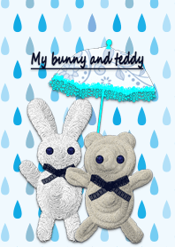 Bunny and teddy bear in rain drops