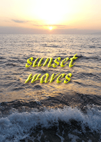 The sea on the shore where the sun sets.