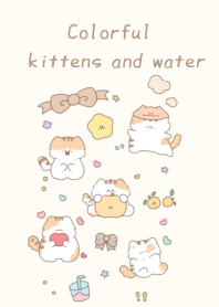 Colorful kittens and water