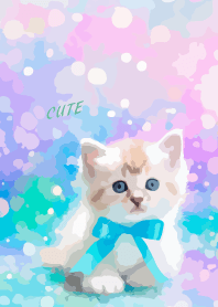 kitten with blue ribbon on blue green