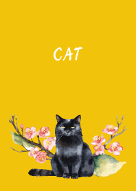 There is a black cat on yellow