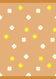 A tiny little flower on brown