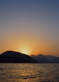 夕映えの海