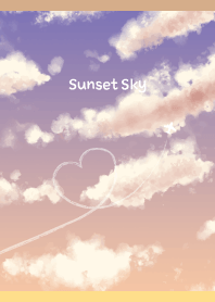 夕暮れの飛行機雲 薄茶と黄色