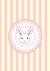Pink and yellow stripe with rabbits.