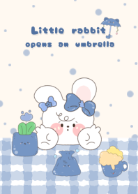 Little rabbit opens an  umbrella1