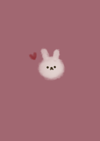 Dull pink and fluffy rabbit.