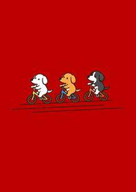 A puppy riding a bicycle-red
