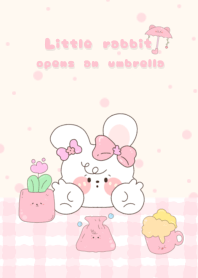 Little rabbit opens an umbrella