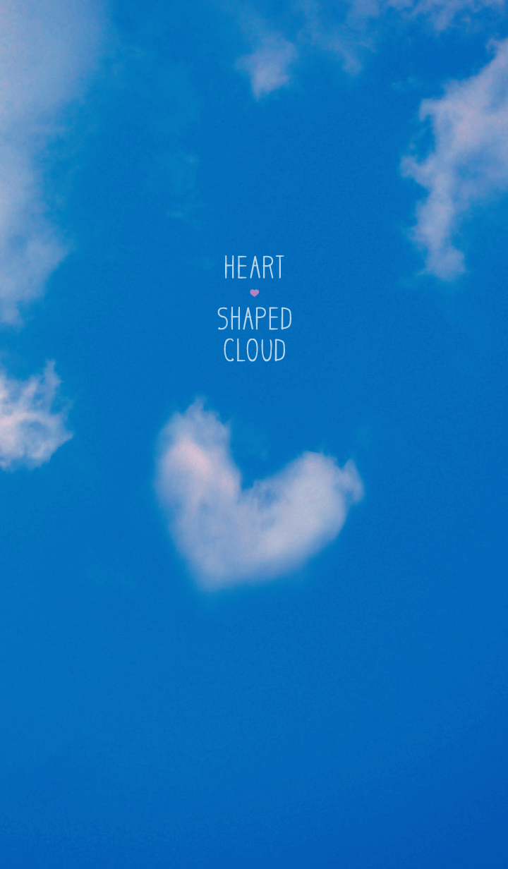 Heart Shaped Cloud In The Blue Sky.