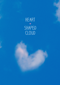 Heart Shaped Cloud In The Blue Sky.