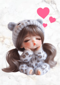 A girl in leopard-patterned pajamas