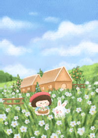 Little girl with blooming flowers