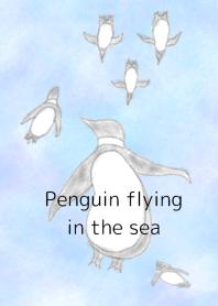 Penguin flying in the sea