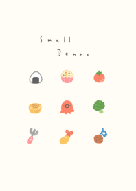 小さなお弁当。黄色ベージュ