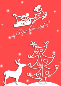Reindeer under Christmas tree in winter