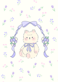 Little bear and purple flowers