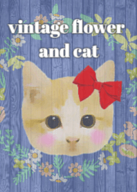 リースの花とリボン猫