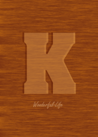 Initial wood carving K.