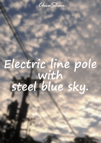 Electric line pole with steel blue sky.