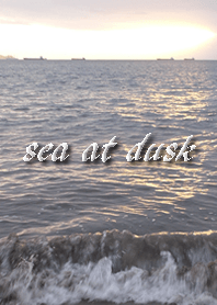 Sunlight shines in the sea at dusk.