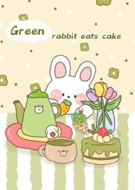 Green rabbit eats cake