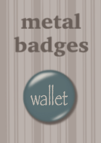 Metal badge of the green color