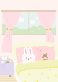 a white rabbit in bed