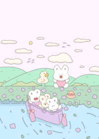 rabbit riding a boat