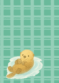 Cute sea otter on blue green