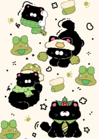 Fluffy black cat with a snow hat2