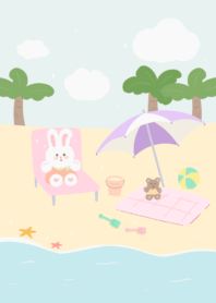 a white rabbit at the beach