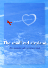 ハート型の雲と赤い飛行機