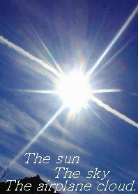The sun, the sky, the airplane cloud.