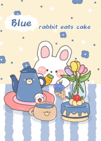 Blue rabbit eats cake