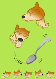 A spoon and dog